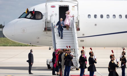 Charles and Camilla disembarking at Orly airport.