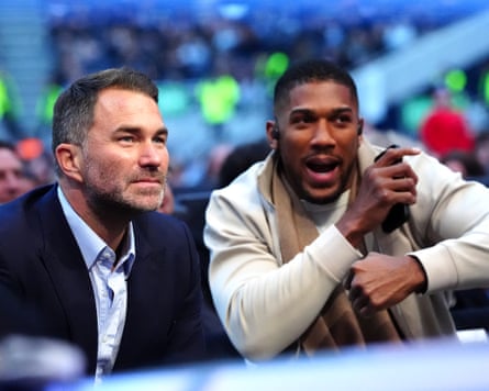 Anthony Joshua and promoter Eddie Hearn enjoy the Fury v Makhmudov fight from ringside