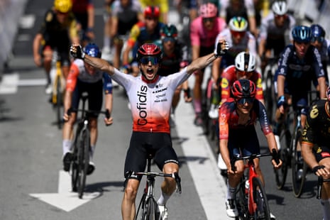 Victor Lafay of France and Team Cofidis celebrates at finish line as stage winner ahead of Tom Pidcock of United Kingdom and Team INEOS Grenadiers.