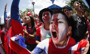 Costa Rican fans celebrate the national team’s 1-0 victory over Italy in the 2014 World Cup.
