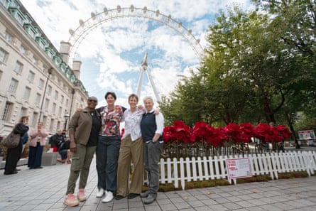 (From left) Maxine Edwards, Janis Ross, Karen Almond, Emma Mitchell at The Trail of Roses installation in front of the London Eye