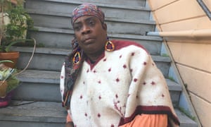 Frances Moore, an activist known locally as Aunti Frances, in front of her home in Oakland, California.