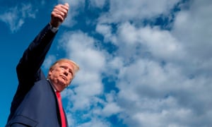 Donald Trump gives a thumbs up as he departs the White House for Camp David on Saturday.