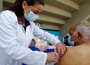 A man receives a coronavirus vaccine at a vaccination centre in Tunis, Tunisia, on 26 April, 2021.
