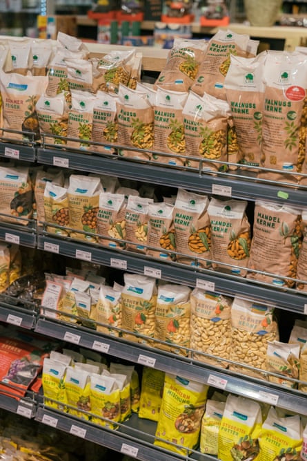 Packets of fruit and nuts on shelves