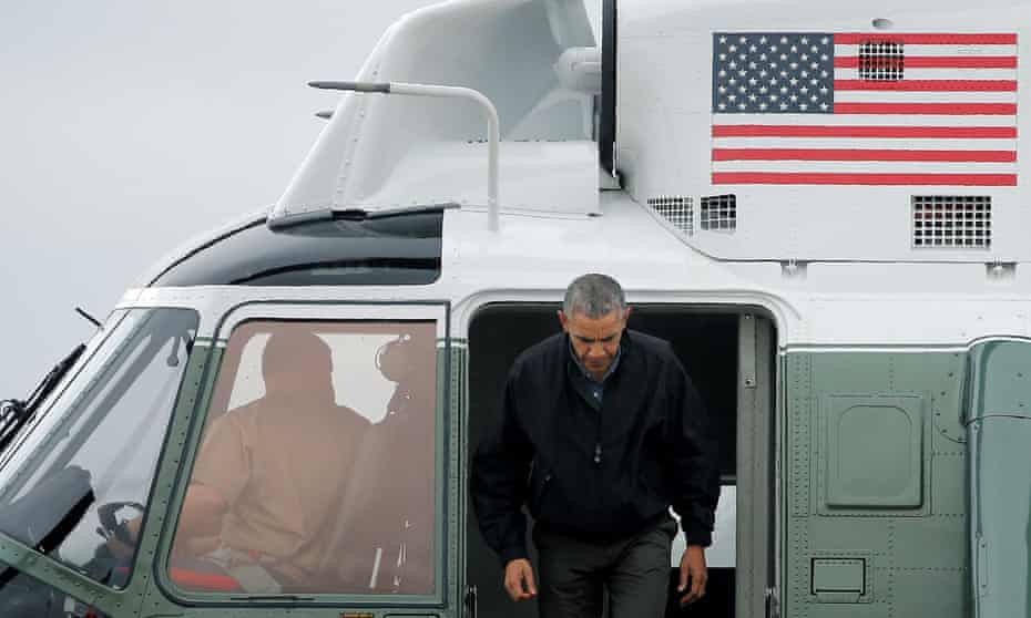 Barack Obama arrives to board Air Force One for travel to Vietnam and Japan.