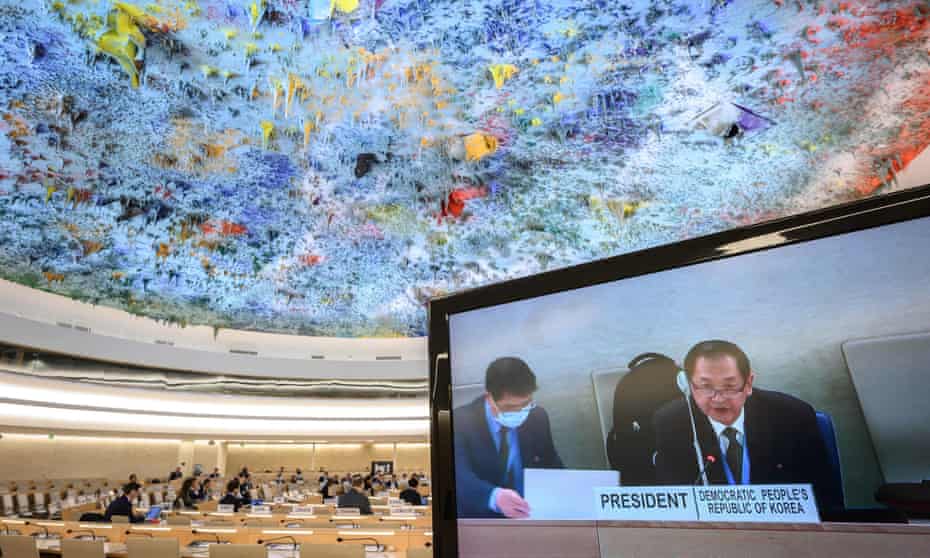 North Korea's ambassador to the UN in Geneva appears on a TV screen in Geneva while chairing the Conference on Disarmament on Thursday