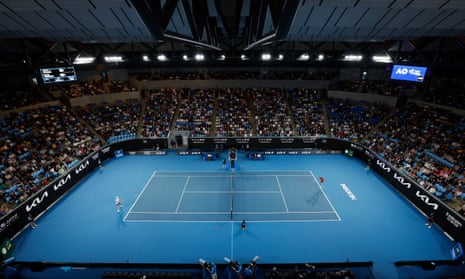 It’s pretty busy in the Margaret Court Arena as Daniil Medvedev (right) serves to John Millman.