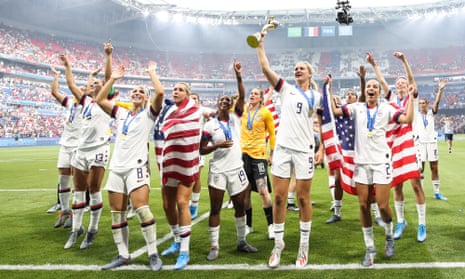The US women’s team celebrate victory at the 2019 World Cup. They will earn more from the men’s campaign in 2022