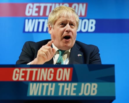 Boris Johnson addresses the Conservative party spring conference in Blackpool, 19 March 2022.