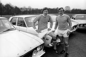 Manchester City and England’s Colin Bell (left) and Francis Lee pose with their new Ford Cortina’s which they, like the rest of England’s 1970 World Cup squad, can use for the year courtesy of Fords of Britain.