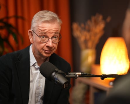 Michael Gove sitting in front of a microphone in the studio