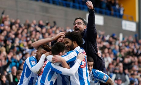 David Wagner, here celebrating a goal against Leeds with his players, led Huddersfield to promotion via the play-offs.