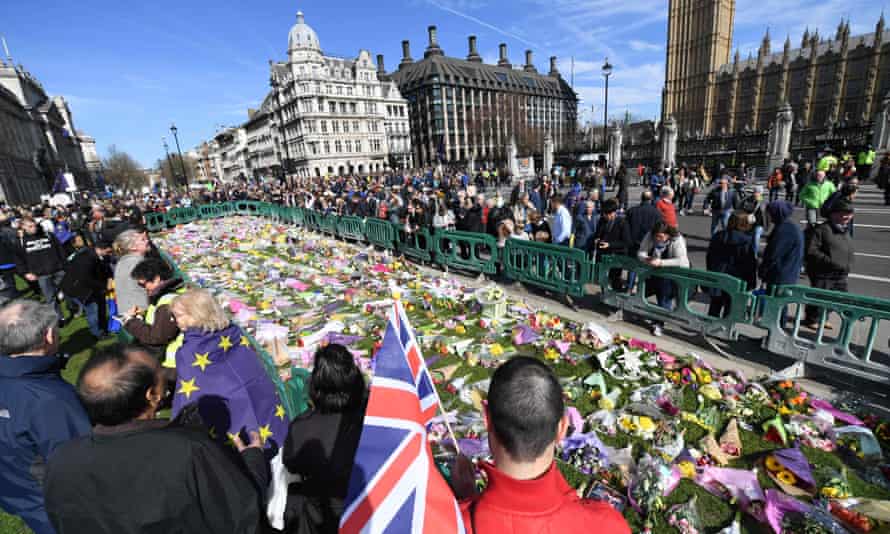 Floral tributes to the victims of the London terror attack on 22 March in Parliament Square.