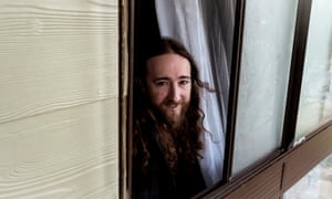 Mick Smart looking out a window