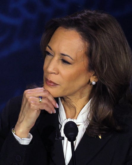Harris listens to Trump