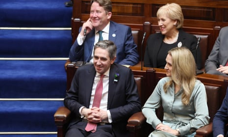 Fine Gael leader Simon Harris TD (left) in the Dail Chamber, Leinster House, Dublin ahead of being nominated as Taoiseach.