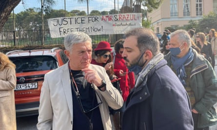 Greek MEP Stelios Kouloglou (left) outside the appeal court in Lesbos with human rights lawyer Alexandros Georgoulis.