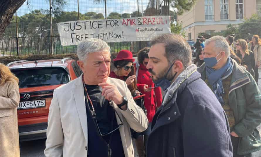 Greek MEP Stelios Kouloglou (left) outside the appeals court in Lesbos with human rights lawyer Alexandros Georgoulis.