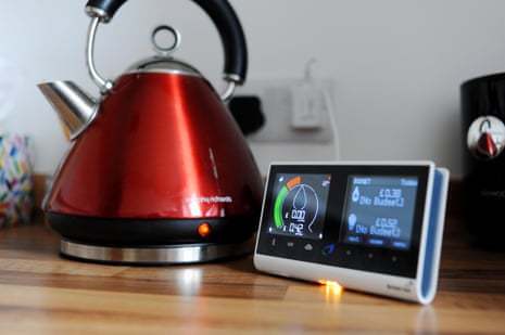 British Gas smart meter showing consumption of electricity and gas used with domestic appliance a kettle in the kitchen.