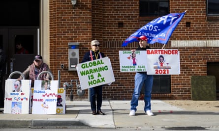 Donald Trump supporters protest a climate crisis summit in Des Moines, Iowa, in 2019.