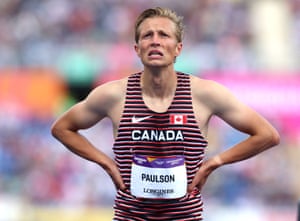 William Paulson checks his time on the scoreboard after finishing in the the men’s 1500m heats.