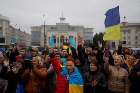 Local residents in the centre of Kherson on Sunday.