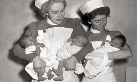 NHS nurses hold the first babies born under NHS care in 1948
