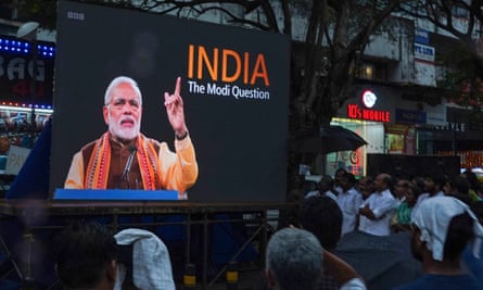 The BBC documentary India: the Modi Question is shown on an outdoor screen in Kochi, southern india.