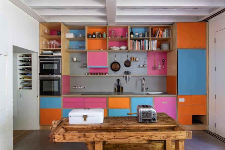 birch ply cupboards with orange, pink and blue-coloured fronts