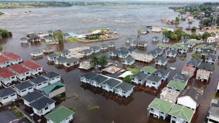 Aerial view of houses in a flooded area next to the Congo River