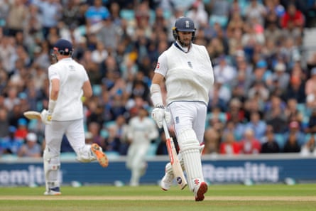 Chris Woakes picks up a single with his arm in a sling after he dislocated a shoulder.