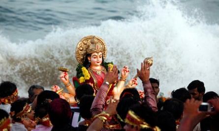 The goddess Durga represents the whole place, the whole community … the Durga Puja festival, India.