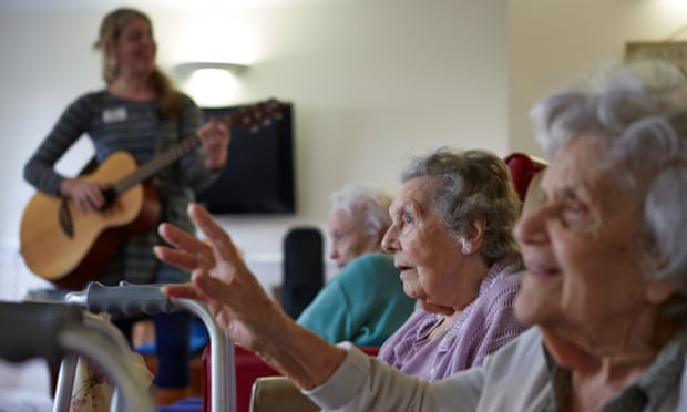 A music therapy group session at a care home. The report says considerable savings could be may be made if the progression of dementia could be delayed.