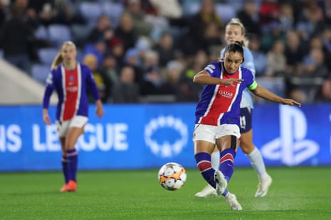 Sakina Karchaoui of PSG strikes the ball during a Champions League match
