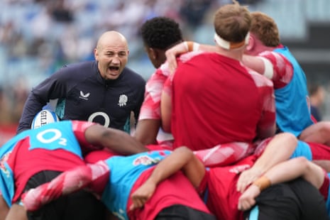 Steve Borthwick shouts instructions towards England's rugby team at a scrum