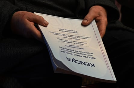 Closeup of hands holding the report