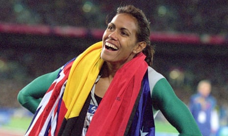 Cathy Freeman celebrates after winning gold at the 2000 Olympics in Sydney.