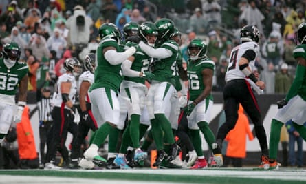 New York Jets safety Ashtyn Davis celebrates his safety against the Atlanta Falcons with teammates