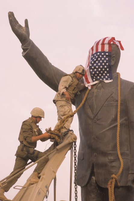 US soldiers preparing to pull down the statue in Firdos Square in 2003.