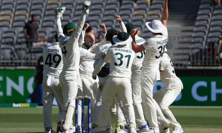 Australia cricket team celebrates as Nathan Lyon takes his 500th Test wicket