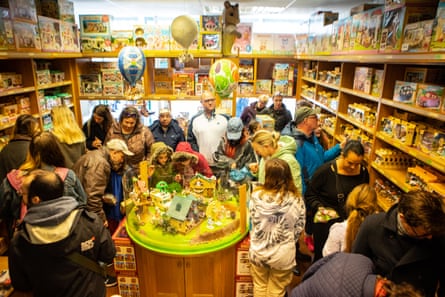 Families gather to buy toys at the Sylvanian Families shop.