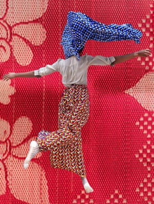 Women in Lagos wearing the veil or hijab while dancing by visual artist Medina Dugger.