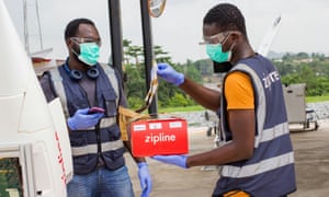 Flight operators scan a package in for delivery in Ghana amid the coronavirus outbreak in Accra, Ghana on 16 April 2020. Picture taken April 16, 2020.