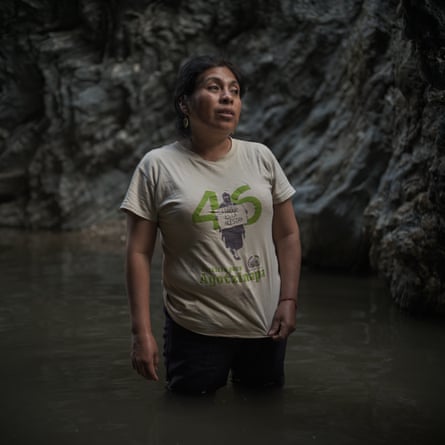Cristina Bautista stands in a river