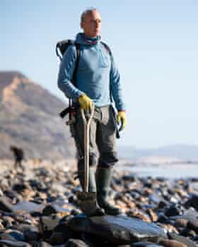 Martin Curtis hunting fossils on the Jurassic coast.