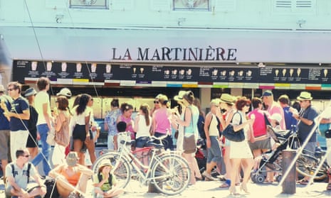 Customers outside famous ice-cream shop La Martinière, Île de Ré, France.