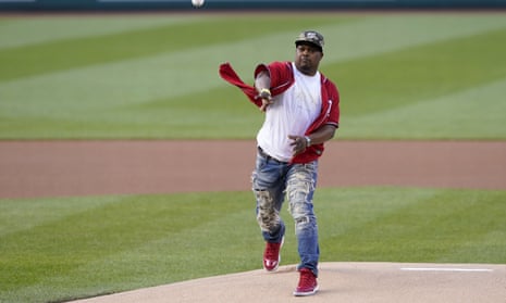 U.S. Capitol Police officer Eugene Goodman throws out the first pitch before the Washington Nationals baseball game against the New York Mets, Friday, June 18, 2021, in Washington.