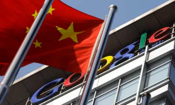 A close up of the Chinese flag flying outside a google office building in beijing china