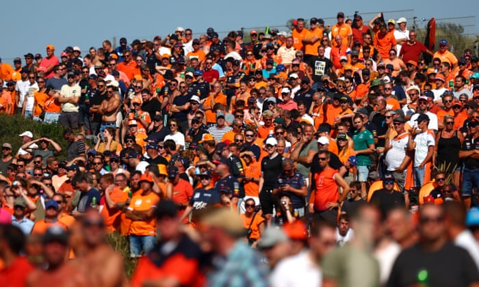 Dutch fans drink in the atmosphere.